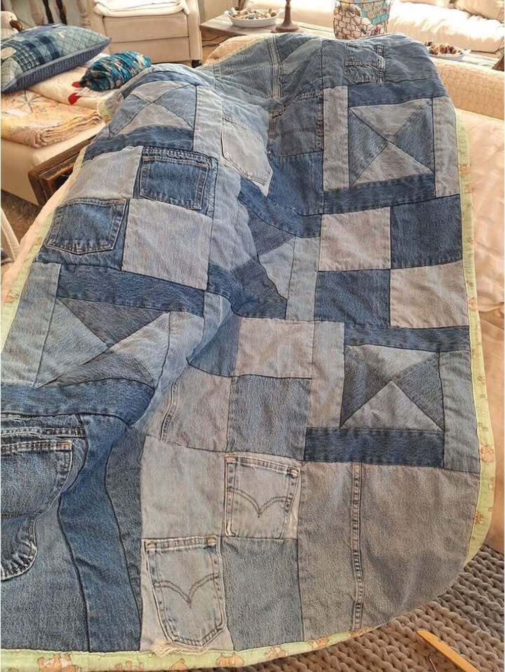 Denim vintage quilt, hand made upcycled Levis too, cotton flannel back. 58"x 36"